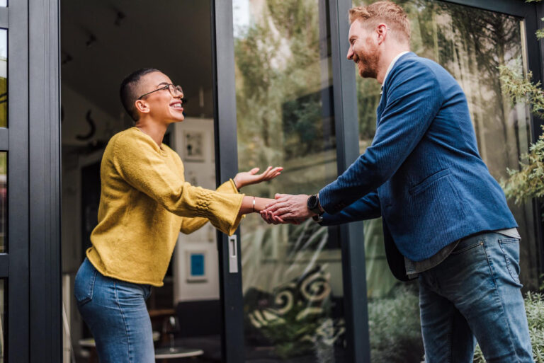 photo-of-woman-shaking-hands-with-estate-agent-while-learning-how-to-sell-your-house-in-the-Netherlands