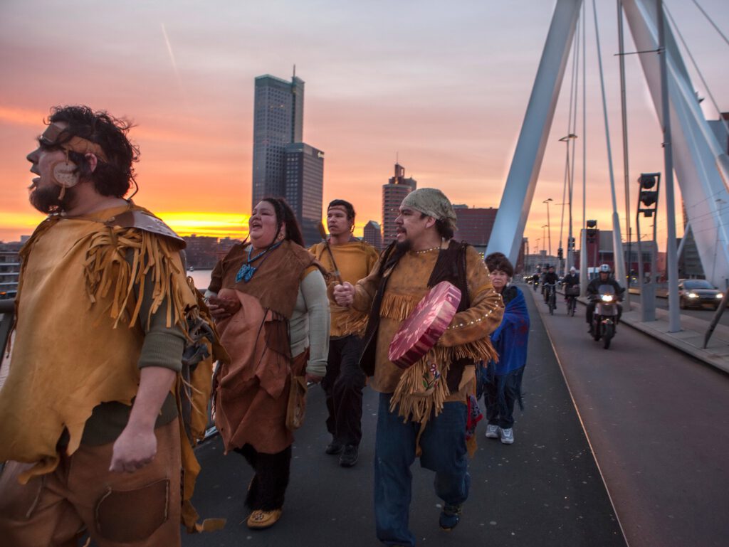 ICAF Rotterdam 2023 Community walking over the Erasmus bridge in Rotterdam