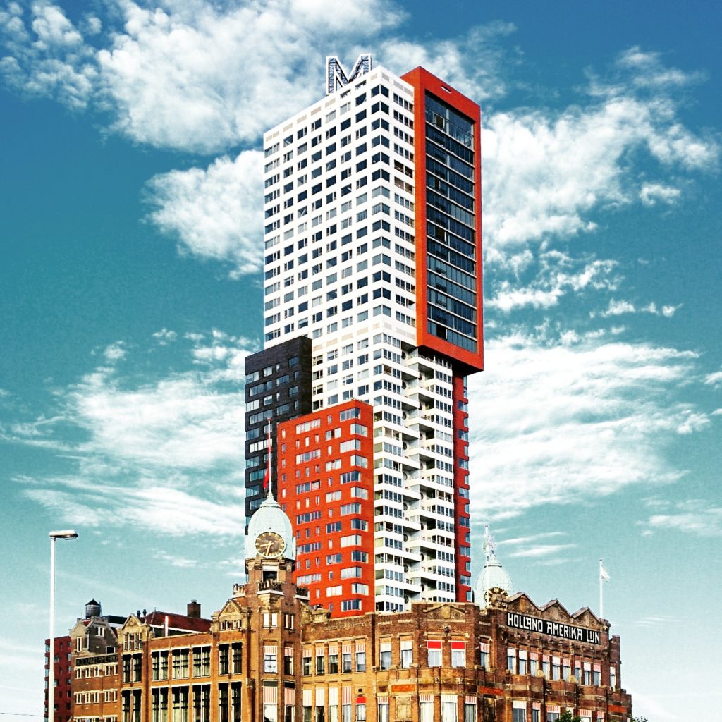 Photo-of-old-dutch-building-combined-with-modern-architecture-Kop-Van-Zuid-Rotterdam