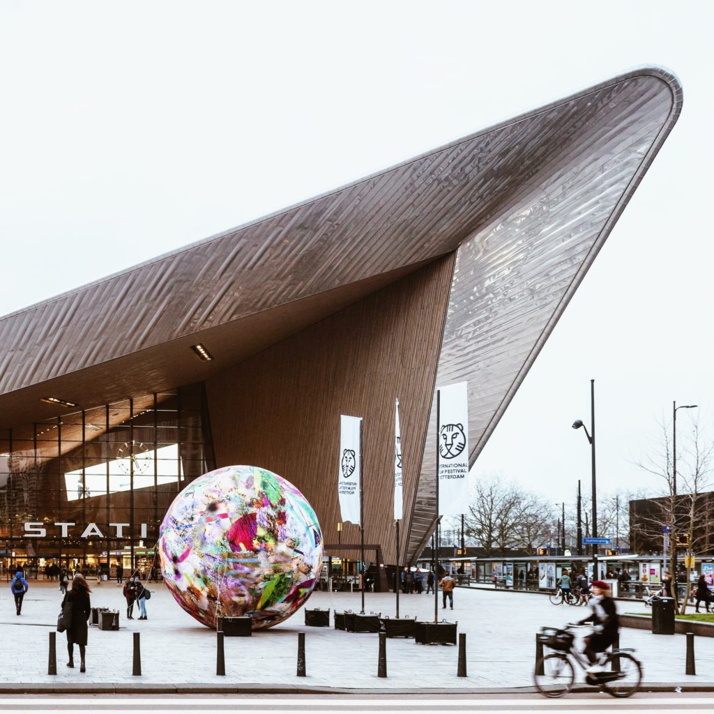 Photo-of-outside-of-Rotterdam-Central-Station-with-travellers