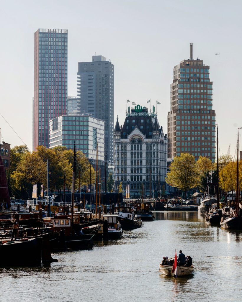 Photo-of-dutch-canal-with-boats-and-architecture-Rotterdam