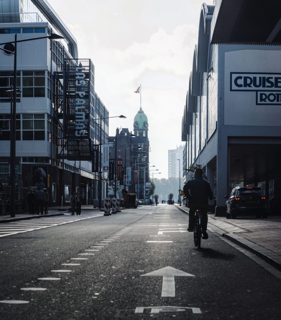 Photo-of-dutch-street-with-buildings-Kop-Van-Zuid-Rotterdam