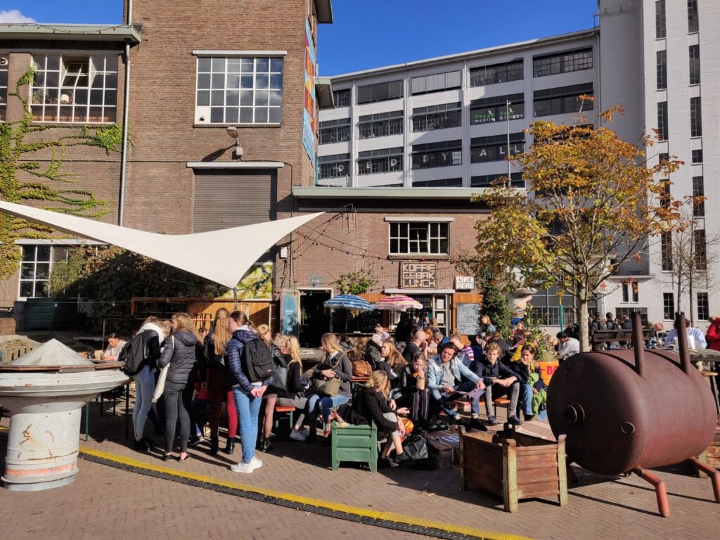 crowd-of-people-sitting-outside-a-restaurant-in-eindhoven