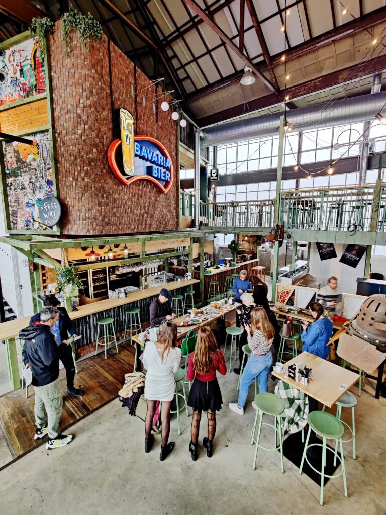 library-in-tilburg-young-people-standing-around-food