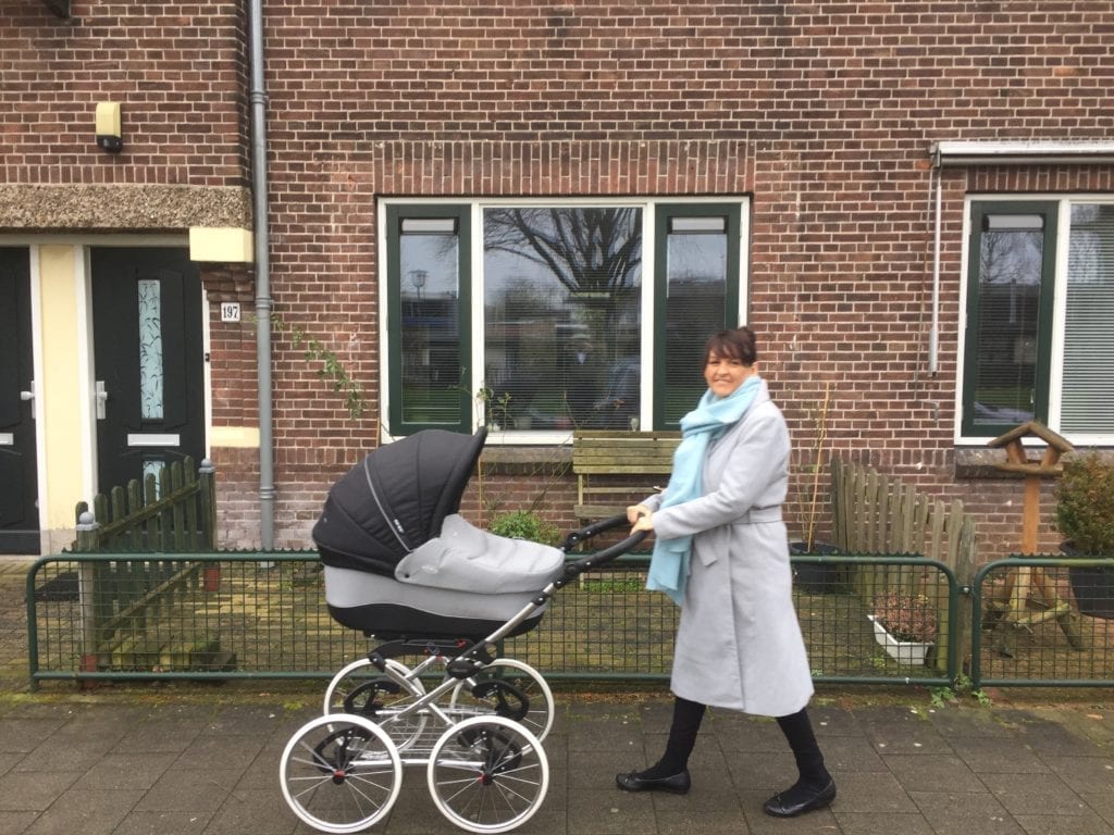 a-mother-pushing-her-pram-in-the-Netherlands