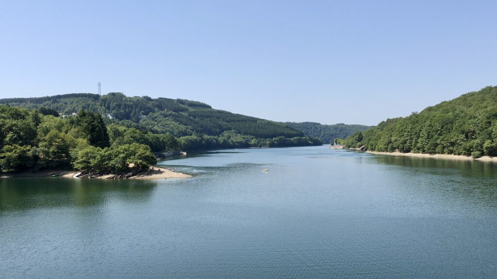 Upper-Sûre-lake-in-Luxembourg-on-a-hot-summer's-day-on-a-road-trip-to-Luxembourg