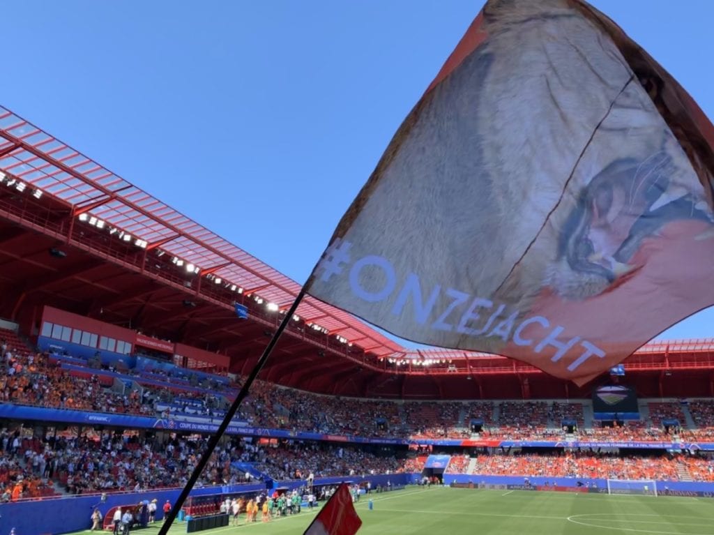 A flag with a lioness on it is waved in the Valencienne's, France, stadium for a Netherlands match in the 2019 FIFA Womens World Cup. 