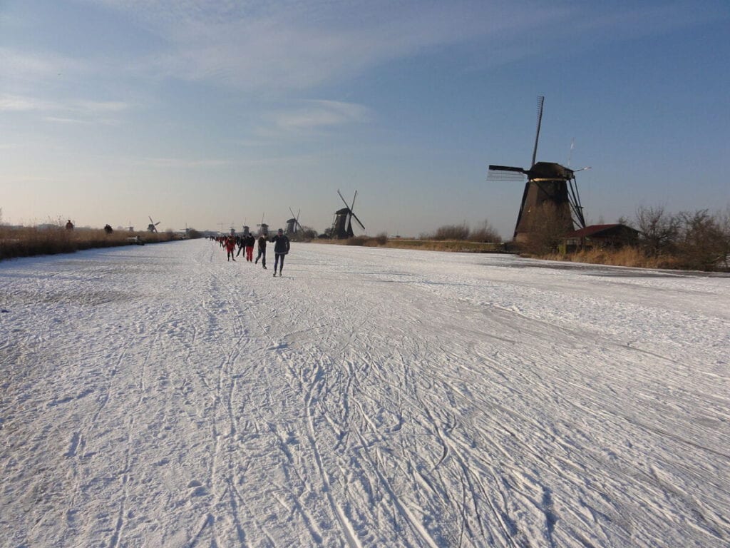 Skaters preparing on the ice at Kinderdijk