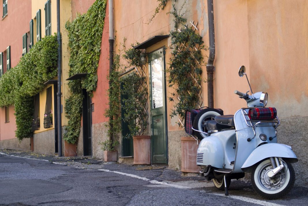Blue-Vespa-in-a-street-in-Italy