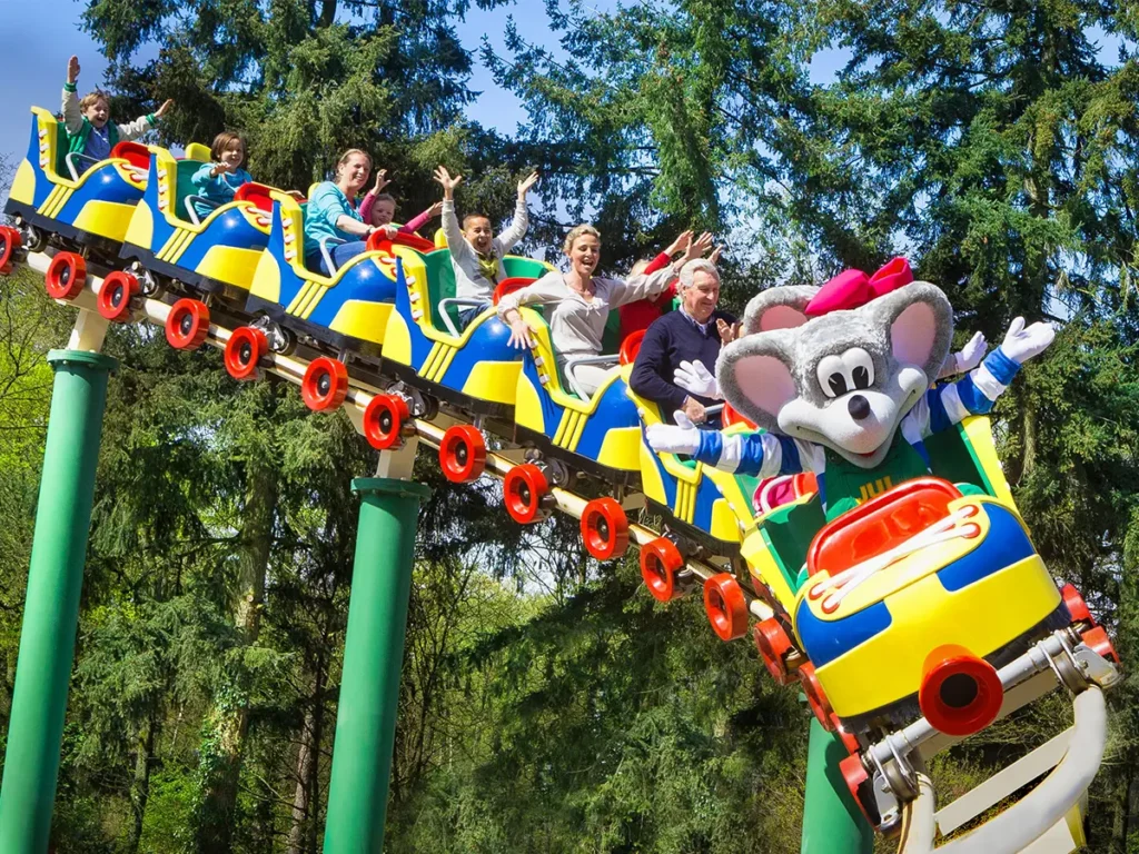 Children-and-parents-enjoying-a-rollercoaster-at-julianatoren-theme-park-in-the-netherlands