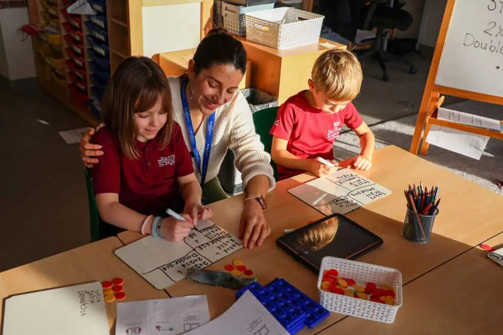 teacher-and-two-young-students-at-the-british-school-of-amsterdam