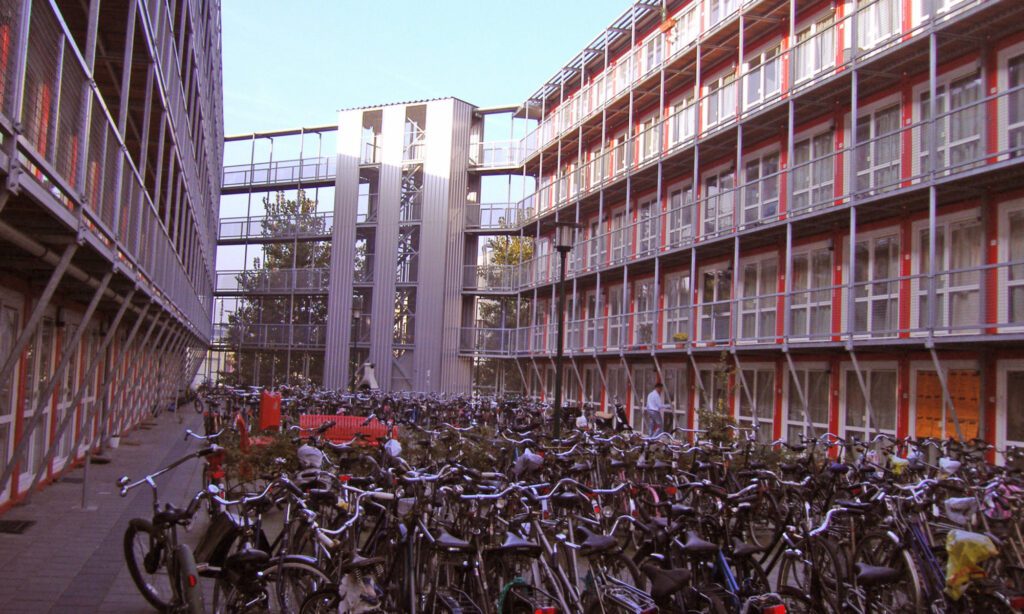 Shipping-container-apartment-blocks-for-students-and-parked-bikes