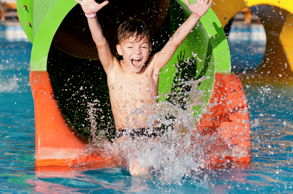 Boy-enjoys-water-park-in-france