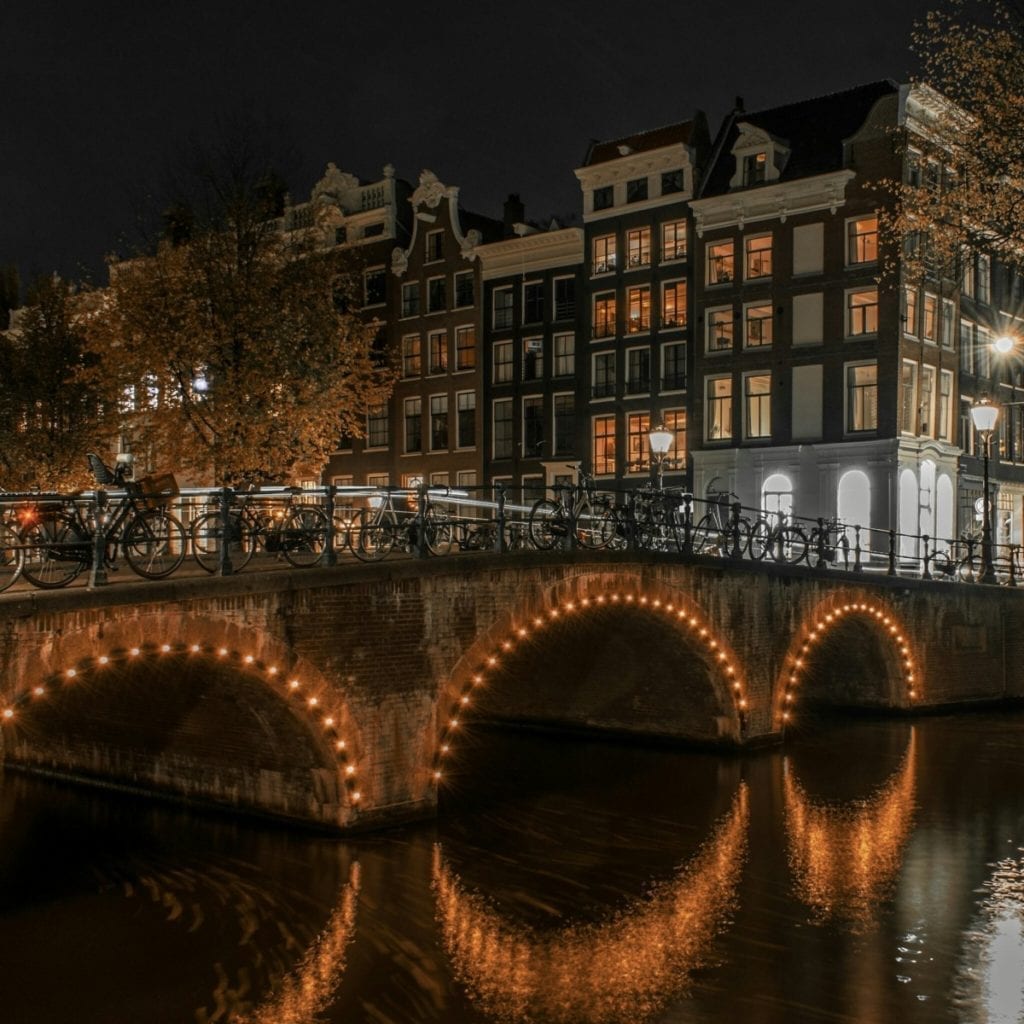 cozy-lights-under-arched-bridge-amsterdam
