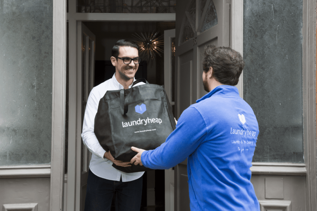 Laundryheap_man-giving-bag