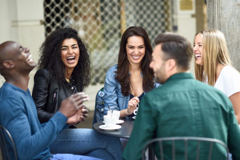 photo-of-people-laughing-after-learning-Dutch-through-Dutch-brainwash-method-with-Talencoach