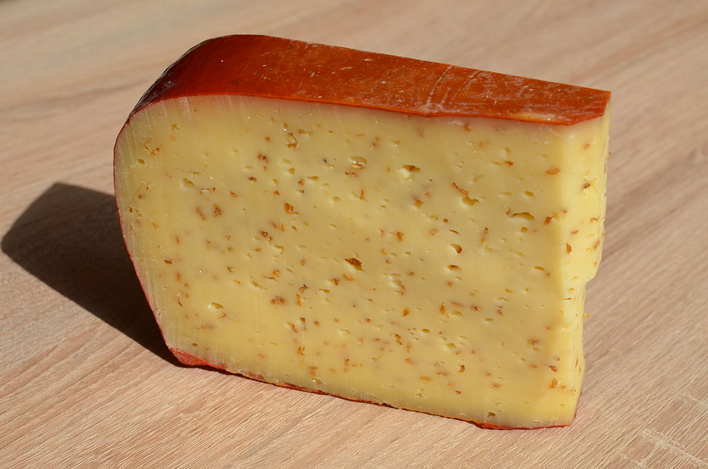 Leyden-cheese-on-a-cutting-board