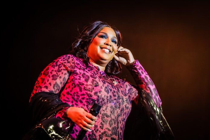 American pop star Lizzo performing on stage in Amsterdam