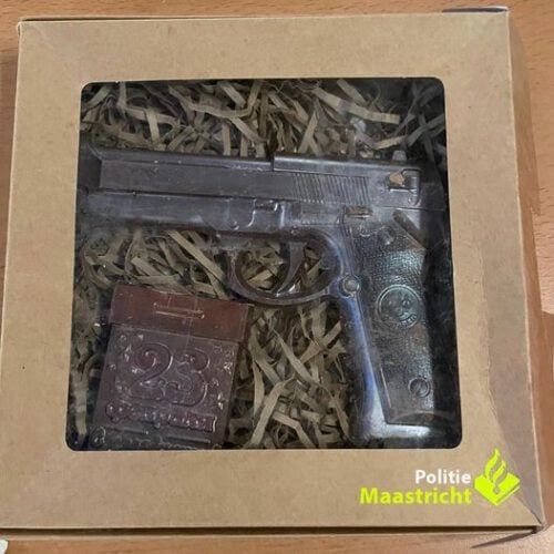 Boxed Chocolate Gun with chocolate ammunition take by the police after concerned resdient calls