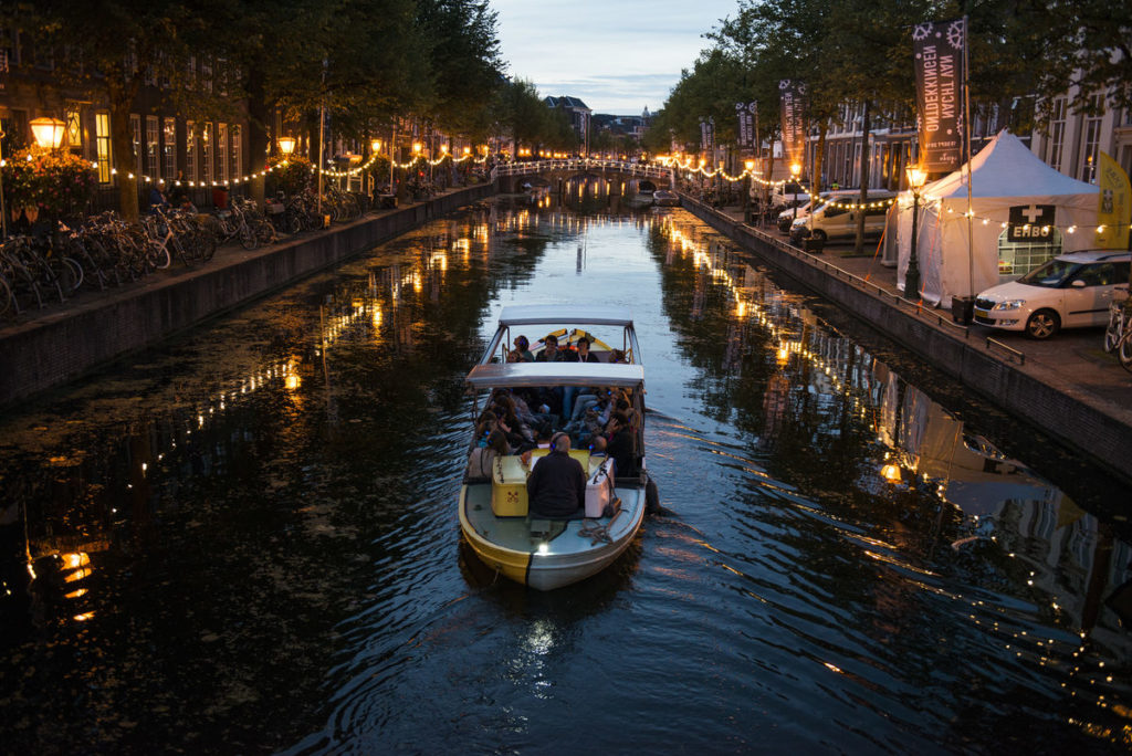 canal boat tour in Amsterdam at night