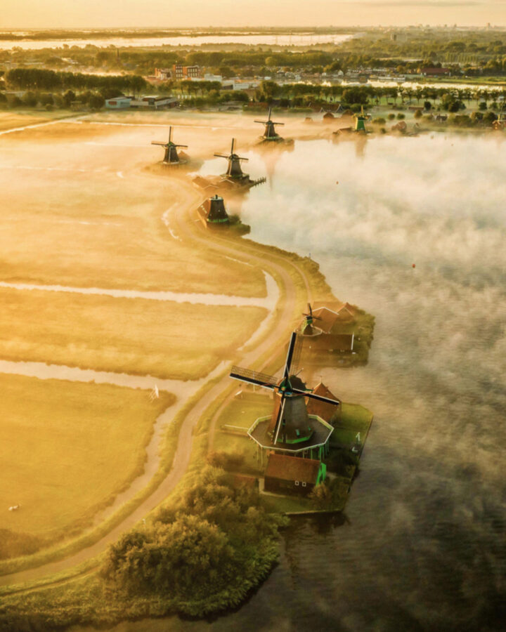 Windmills at the Zaanse Schans on a foggy morning