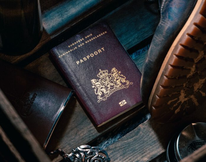 picture-of-a-Dutch-passport-surrounded-by-travel-gear