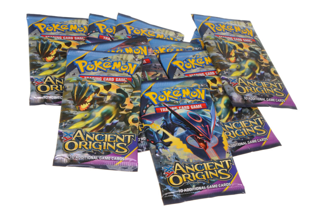 Packs-of-pokemon-ancient-origin-cards-on-a-white-background