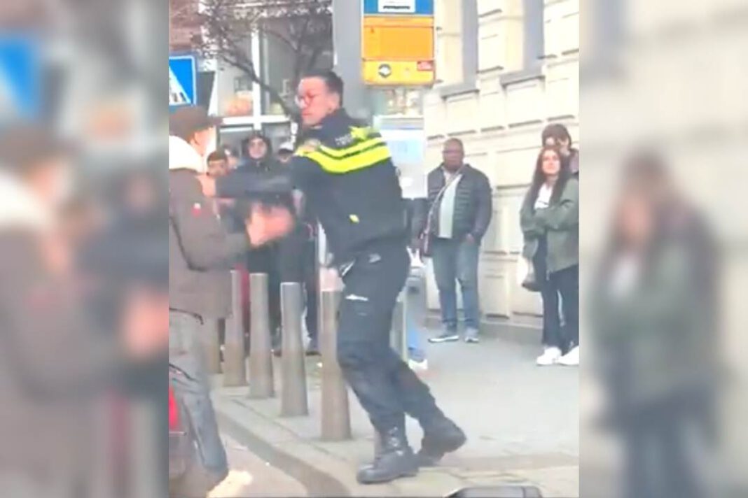 photo-of-rotterdam-police-officer-hitting-boy