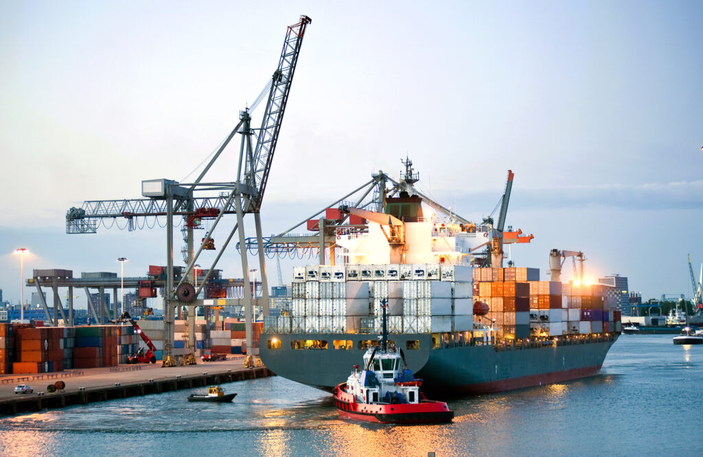 containers-being-manouvered-towards-shore-at-largest-port-in-europe-rotterdam-netherlands