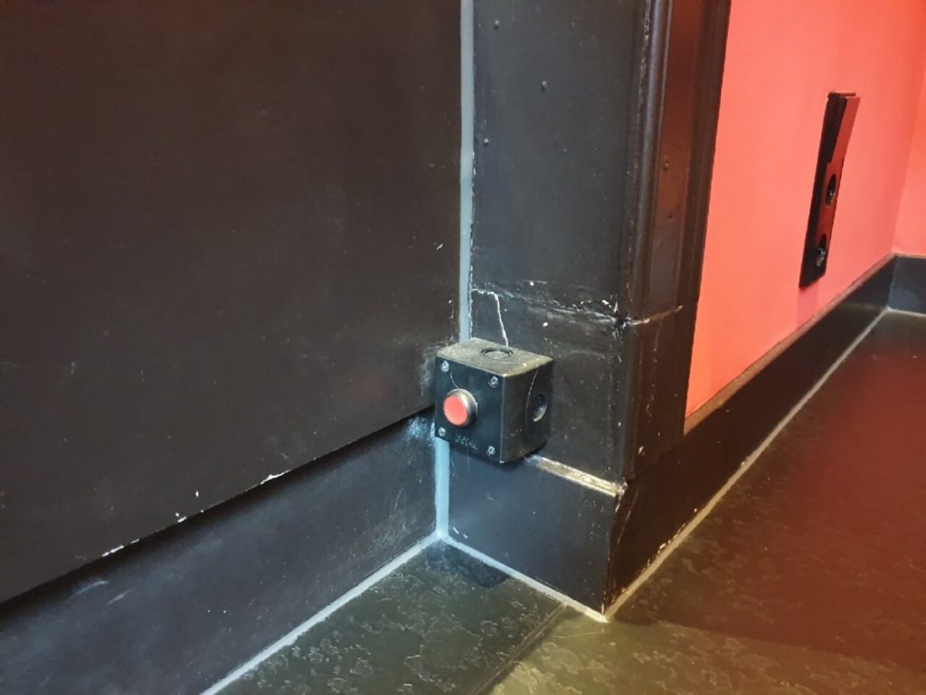 Prostitution in the Netherlands - Safety button at the Red Light District Amsterdam