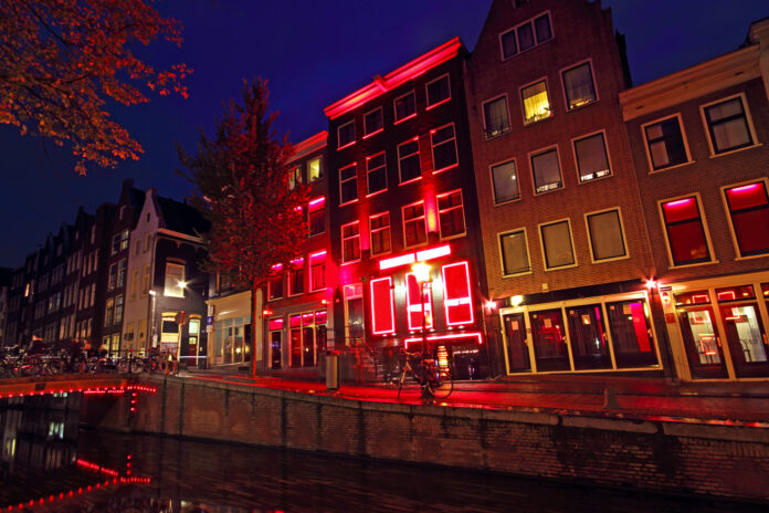 red light district illuminated at night
