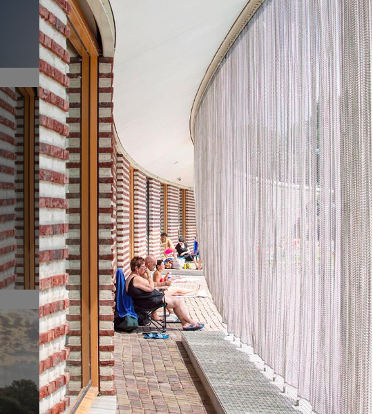 Image-of-people-relaxing-at-facade-of-Noorderparkbad-in-Amsterdam