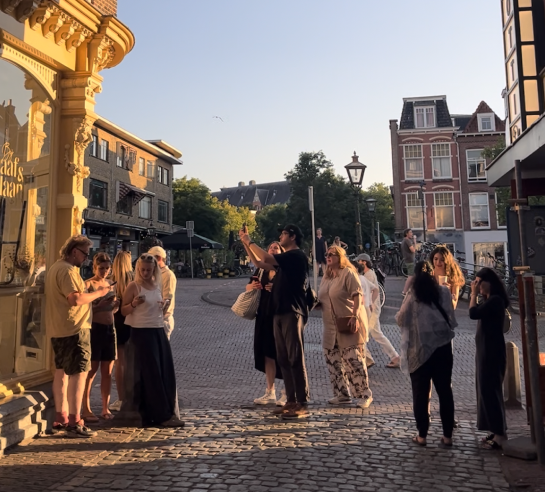 group-of-people-watching-solar-eclipse-in-leiden-netherlands