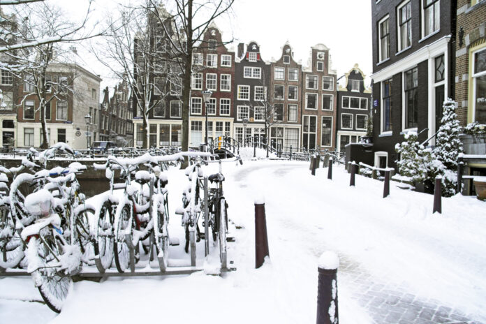 Thick-snow-covering-a-street-in-amsterdam-the-netherlands