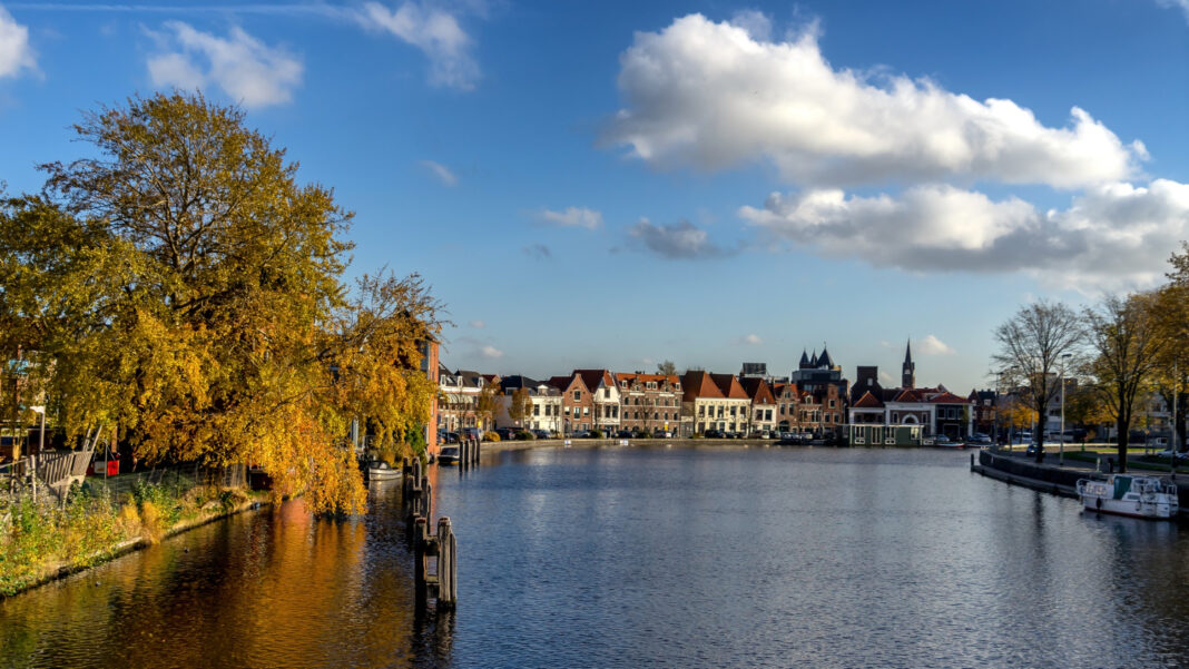 Spaarne-river-in-haarlem-the-netherlands-with-blue-skies