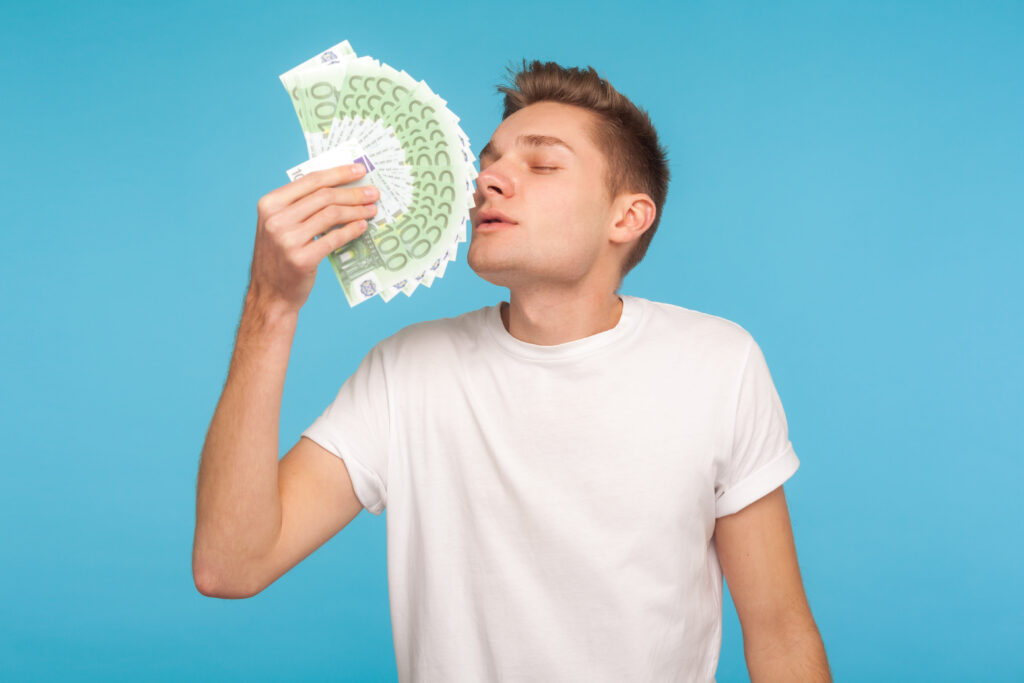 Greedy-landlord-fanning-himself-with-money