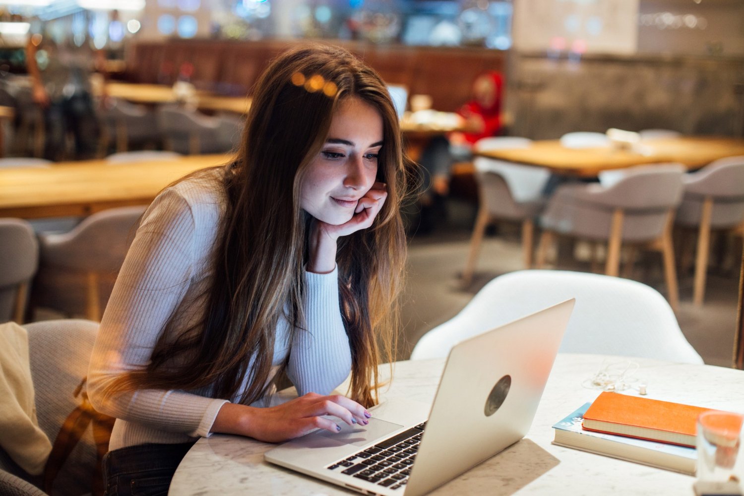 photo-of-woman-on-laptop-attending-webinar