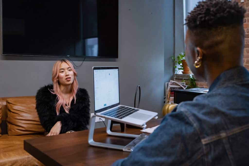 photo-of-young-trans-woman-talking-to-her-dutch-lawyer-about-changing-her-legal-name-in-the-netherlands