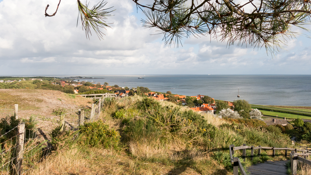 photo-of-dutch-wadden-island-vlieland-from-dune-overlooking-village-and-sea