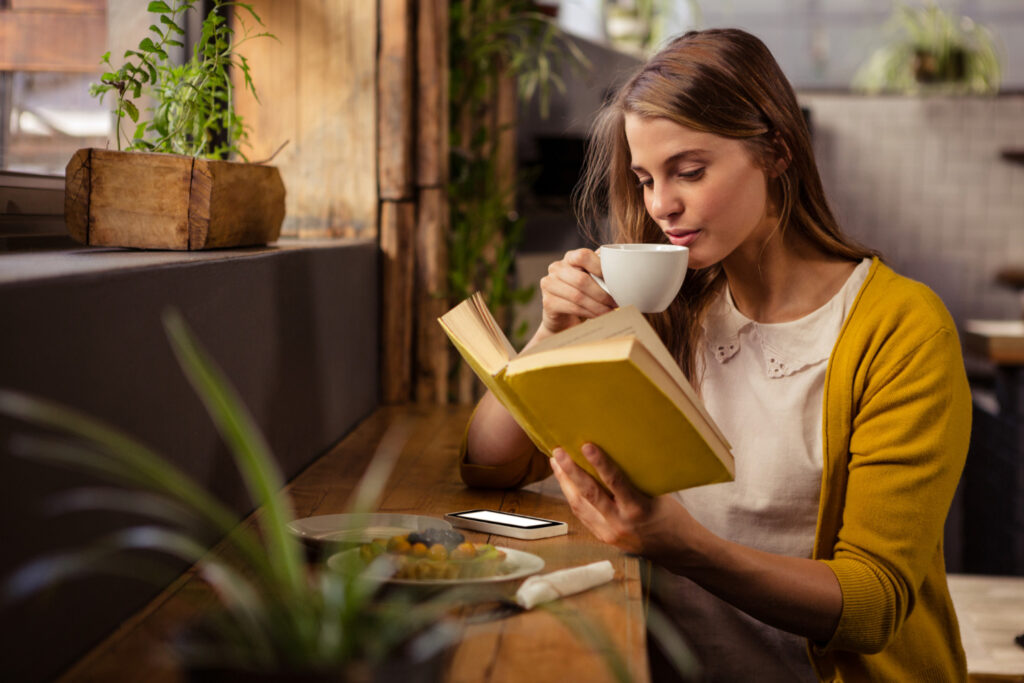 woman-reading-a-book-that-she-borrowed-from-leeszaal-rotterdam-in-the-netherlands