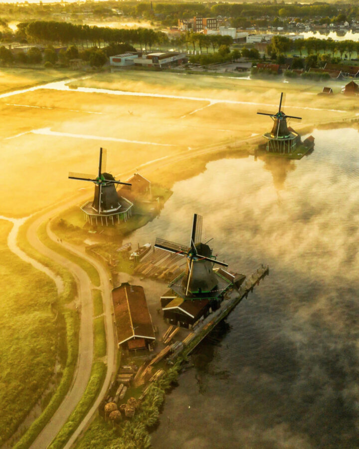 Windmills at the Zaanse Schans on a foggy morning
