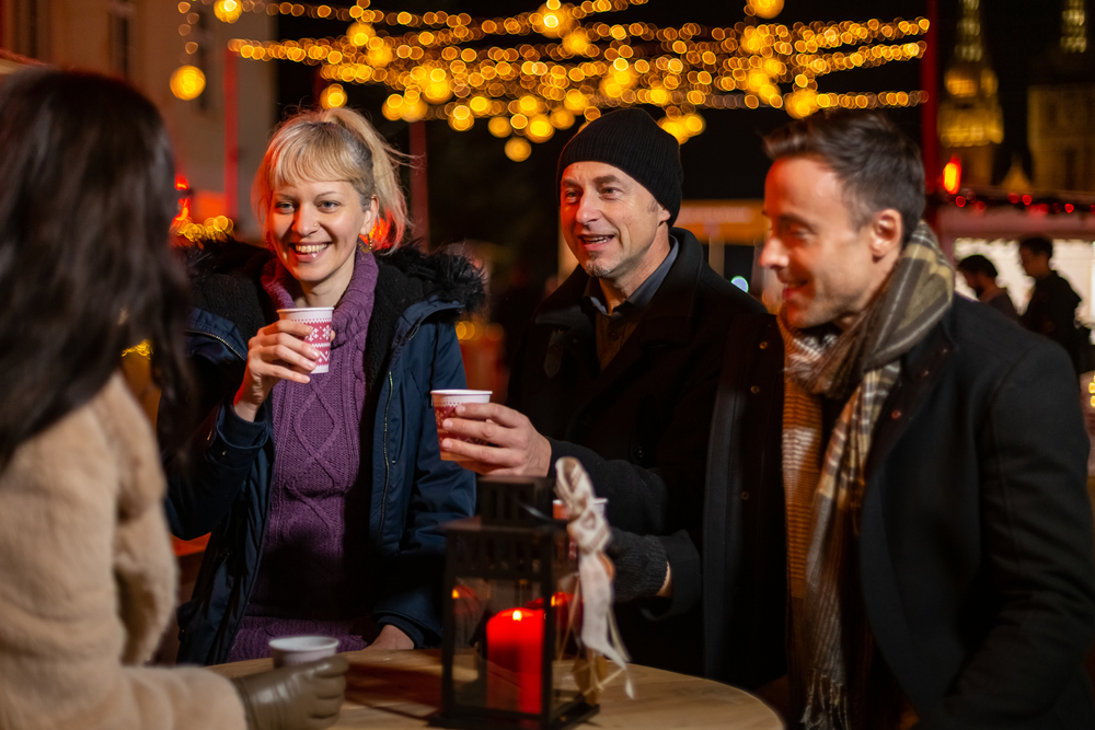a-group-of-friends-drinking-mulled-wine-at-a-christmas-market-in-Netherlands