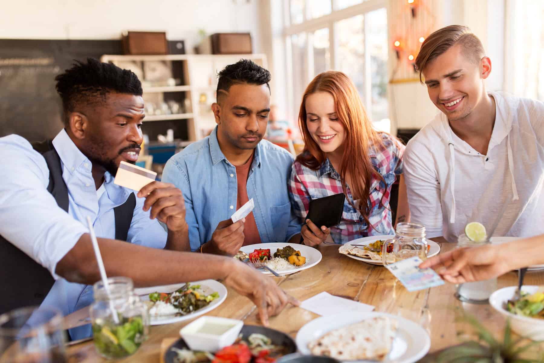 A-photo-of-a-group-of-friends-splitting-the-bill-at-the-restaurant-in-the-netherlands