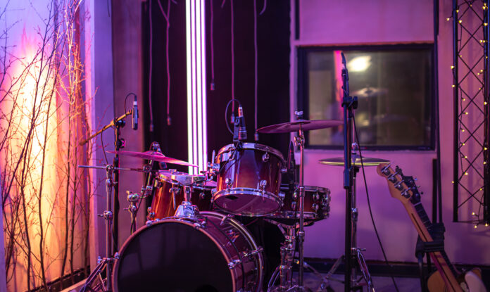 a-recording-studio-bathed-in-purple-light-scaled