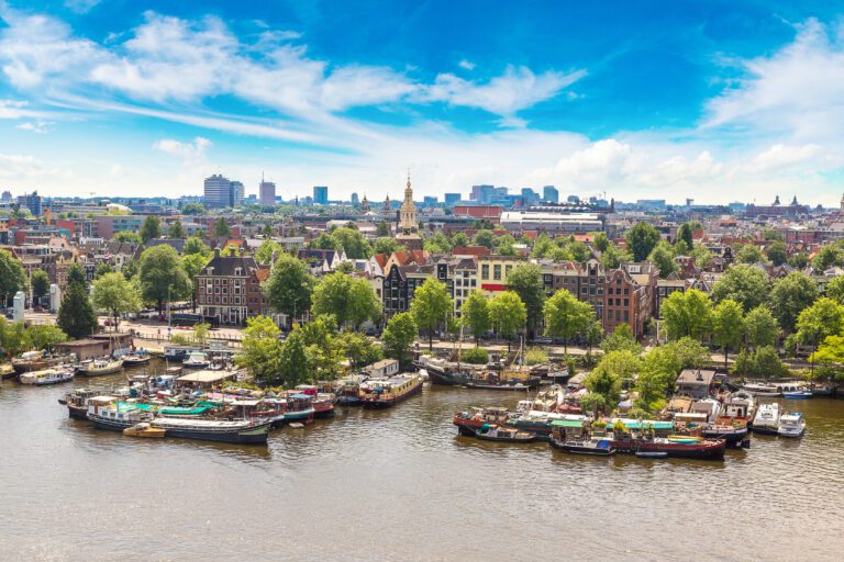 Panoramic-aerial-view-of-Amsterdam-on-a-beautiful-summer-day