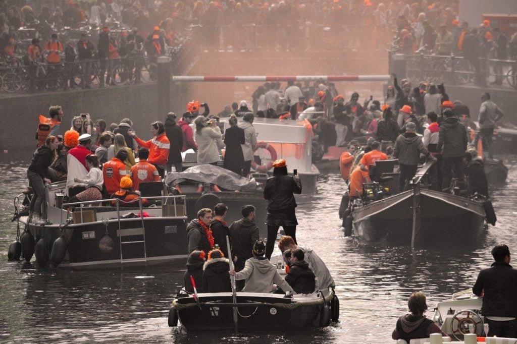 Boats on canals Amsterdam Kings's Day 2020