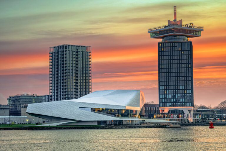 Eye-Film-Museum-and-A'dam-Tower-in-Amsterdam-during-sunset-buildings-on -the-north-side-of-the-River-IJ