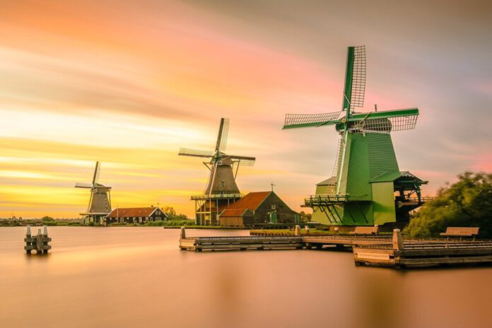 photo-of-zaanse-schans-windmills-sunset