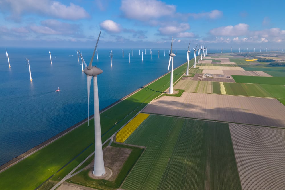 aerial-photo-of-dutch-windmills-and-ocean