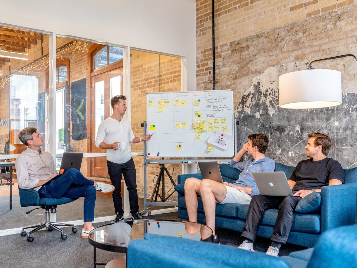 Photo-of-people-in-meeting-in-office 